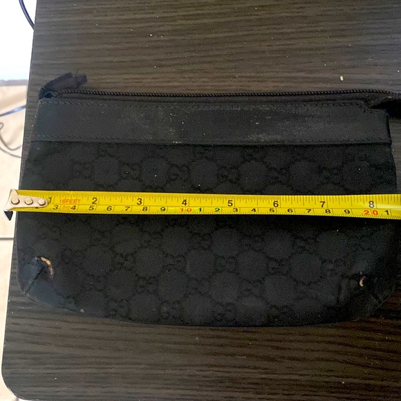 In a classic black GG nylon print, I am a stylish & classic pouch - Picture 1 of 5